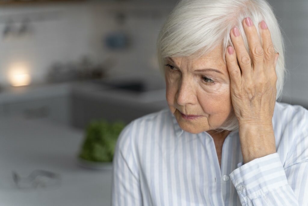 Senior woman supporting her brain health with Ibis-guided cognitive wellness tools.