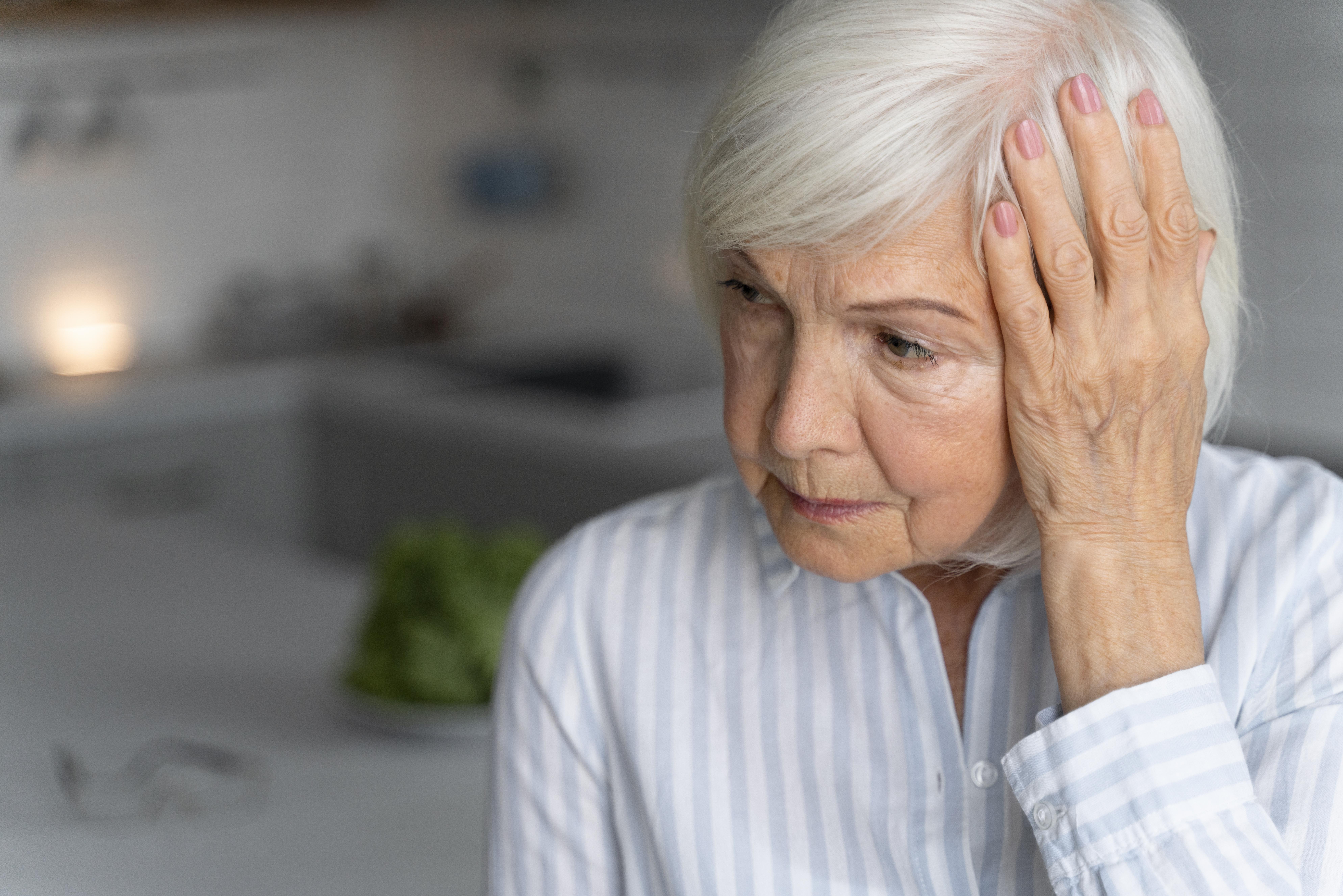 Senior woman supporting her brain health with Ibis-guided cognitive wellness tools.