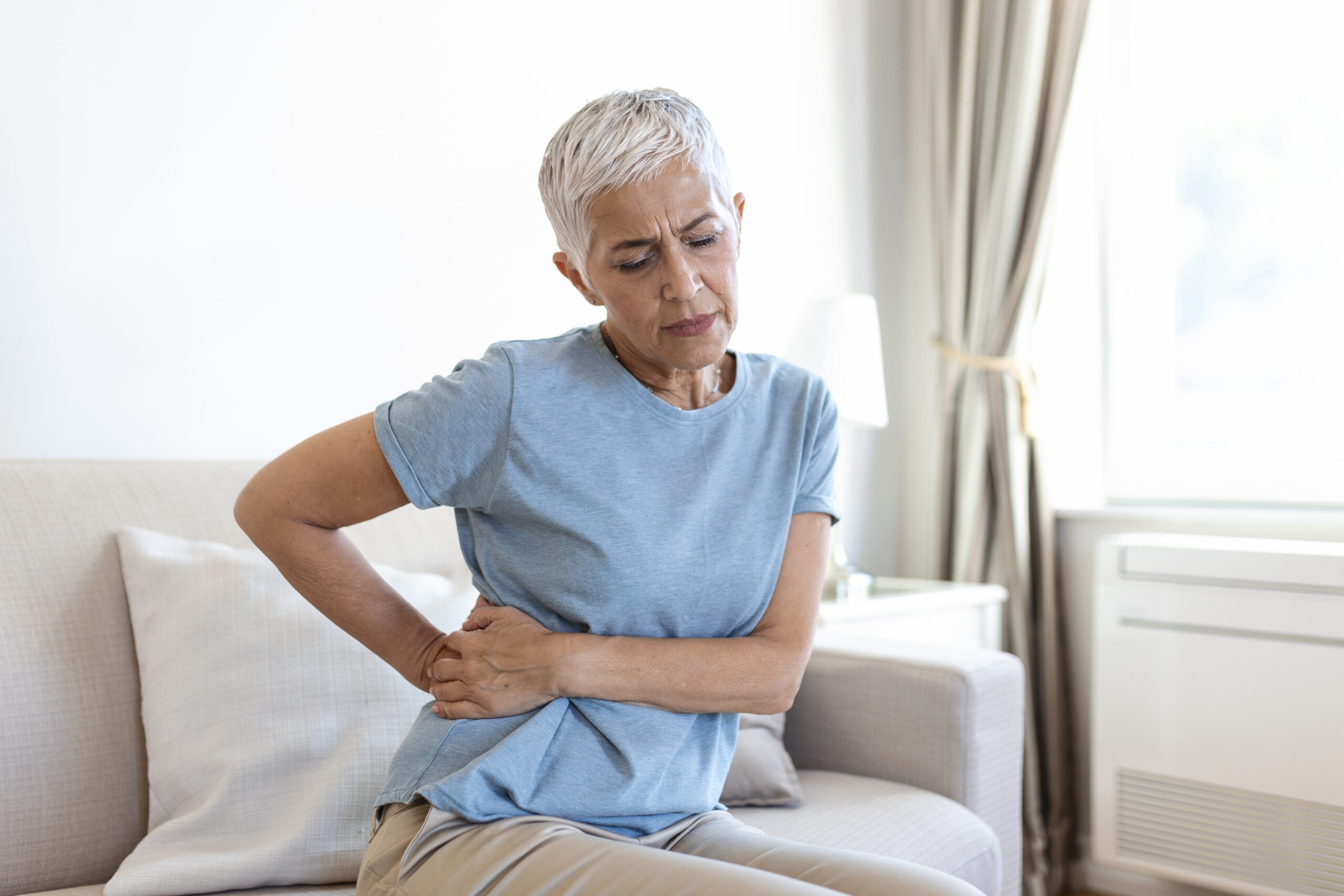 Senior woman supporting her chronic kidney problems with Ibis-guided wellness tools.