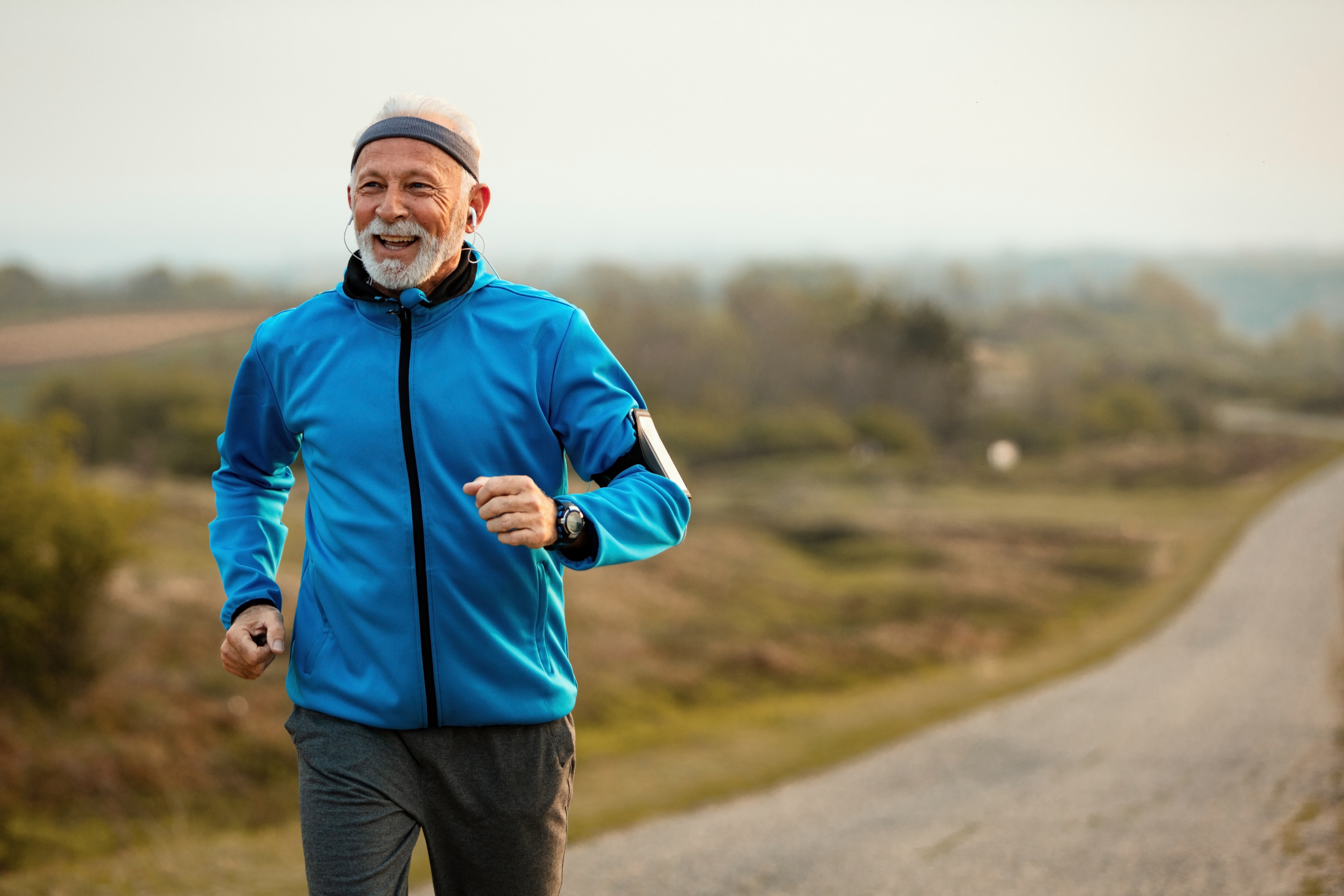 Senior man jogging confidently, thanks to Ibis Health’s chronic care management.